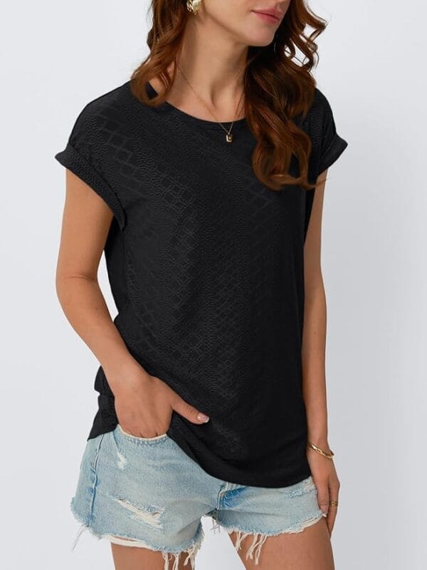Close-up of AUTOMET Women’s T-Shirt, featuring intricate eyelet embroidery and soft, breathable fabric.