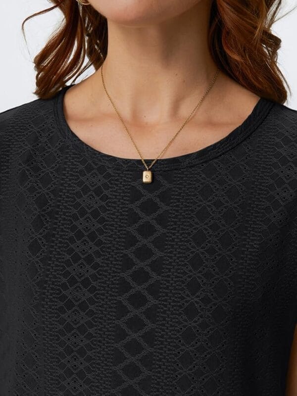 Back view of AUTOMET Women’s Eyelet Embroidery Blouse, featuring stylish detailing and a relaxed fit.