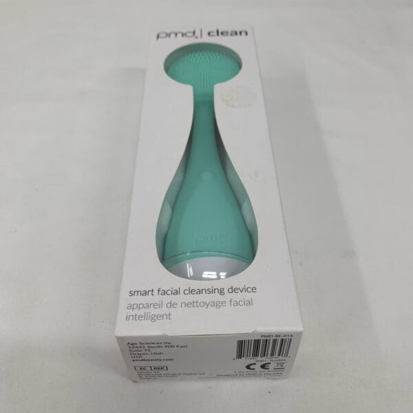Close-up of PMD Clean Smart Facial Cleansing Brush with detailed view of bristles and texture