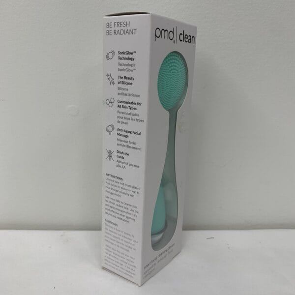 Detailed shot of waterproof build and finish of PMD Clean Smart Facial Device in teal