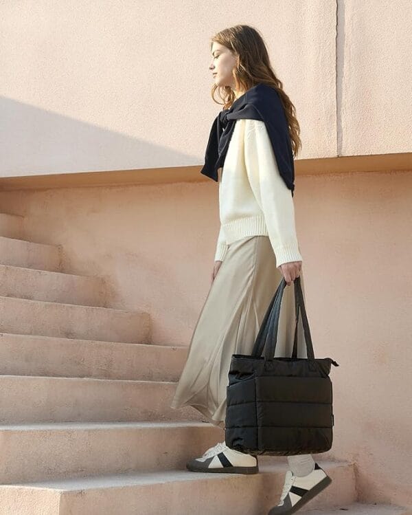 Interior view of BAGSMART shoulder bag revealing multiple compartments and roomy space