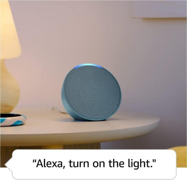 Side profile view of Echo Pop showing curved smart speaker design in teal finish