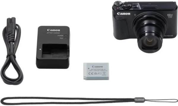 Close-up of Canon SX740 HS Digital Camera with zoom lens fully extended.