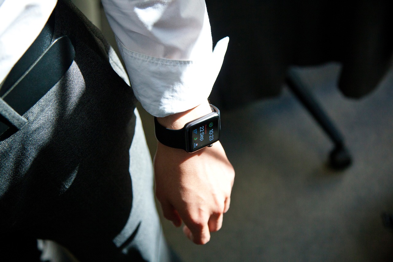 Fitbit and a watch worn together with Fitbit Luxe, Charge 5, and Inspire 3 bands