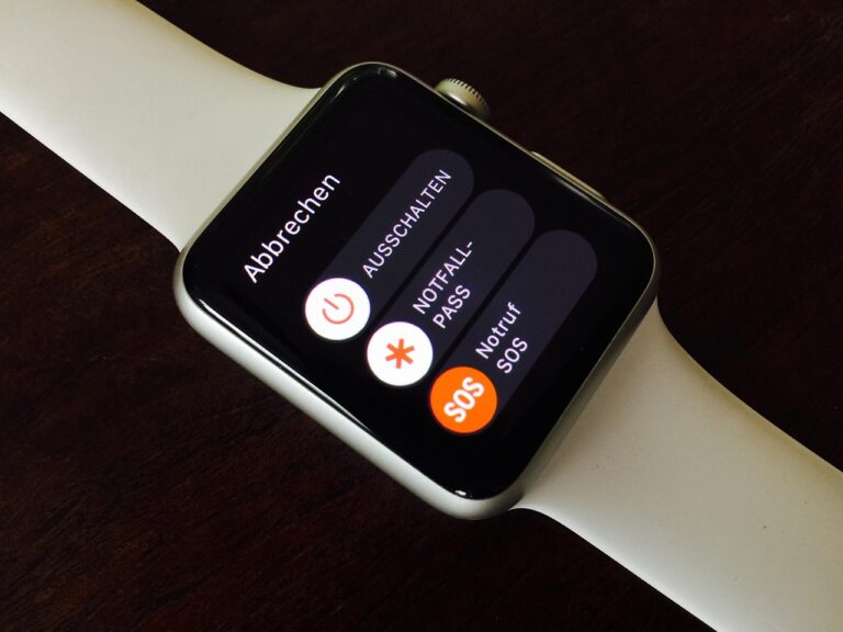 leather Apple Watch band worn on wrist showing buckle and fit