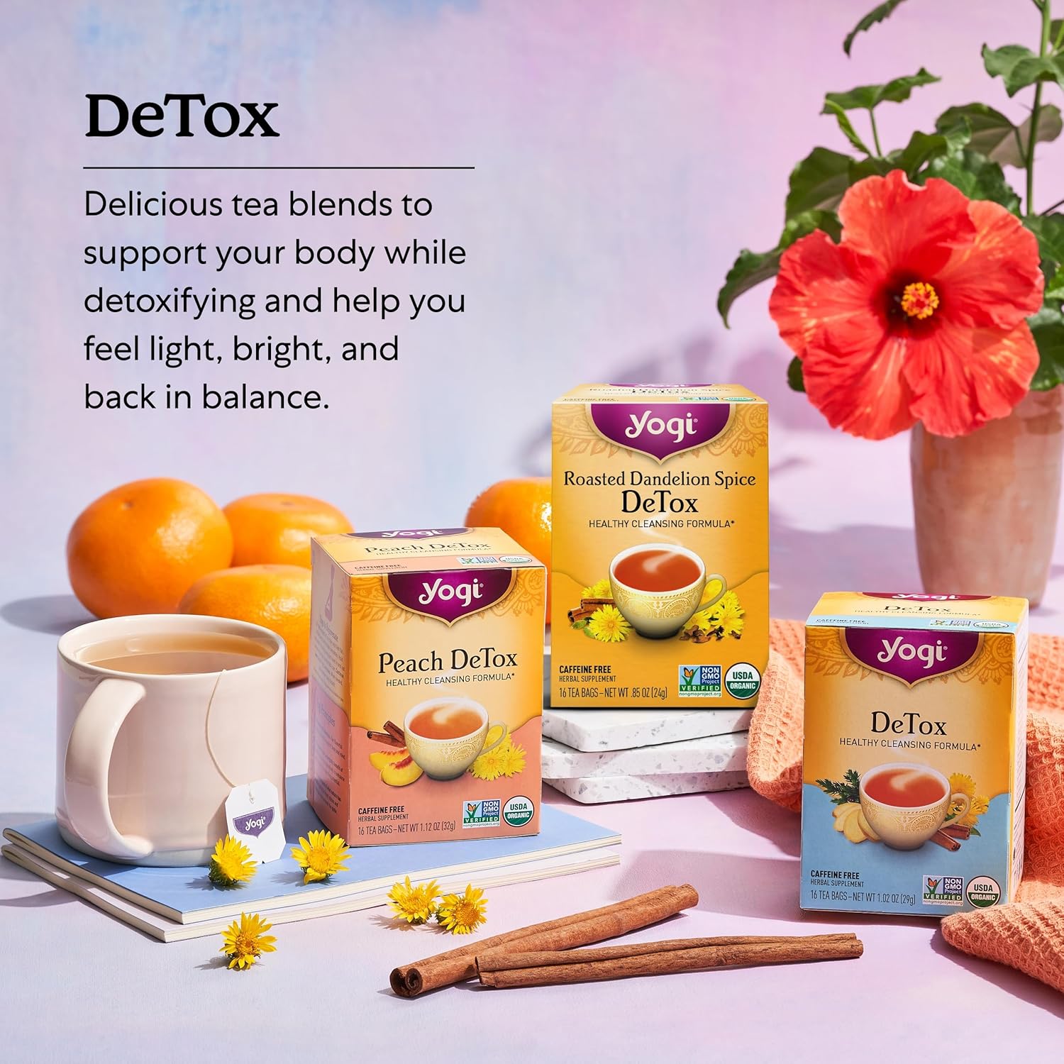 Detox cleansing tea in glass cup with fresh herbs and lemon