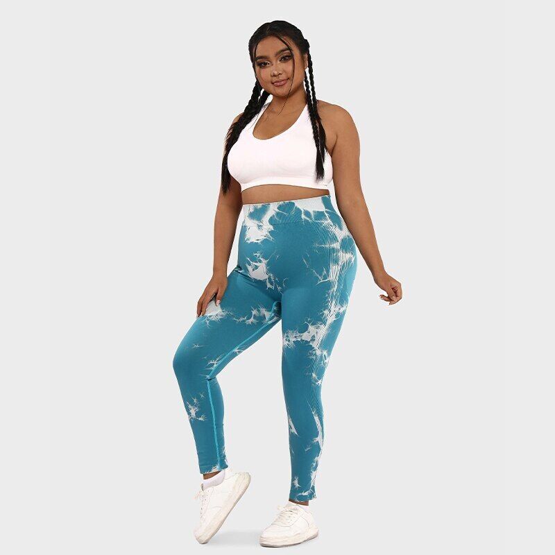 Plus size activewear for women featuring high-waist leggings, supportive sports bras, and breathable workout tops for comfort and style