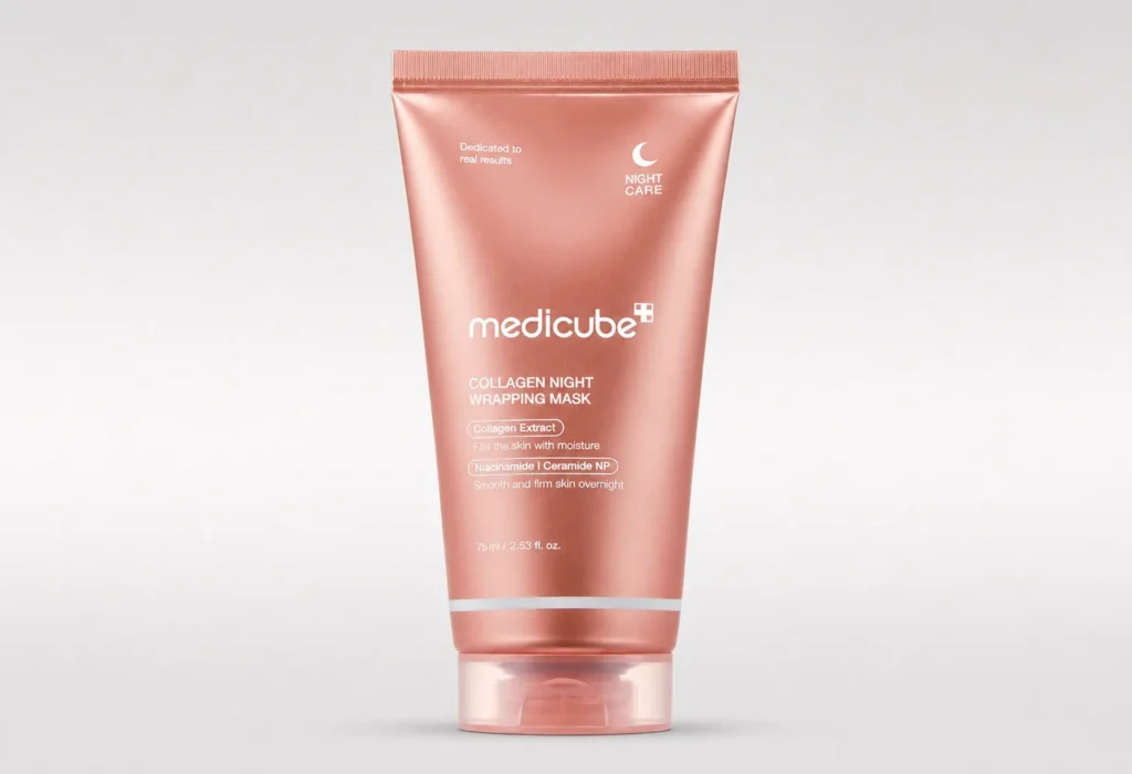 Medicube Collagen Night Wrapping Mask in pink tube on a neutral background