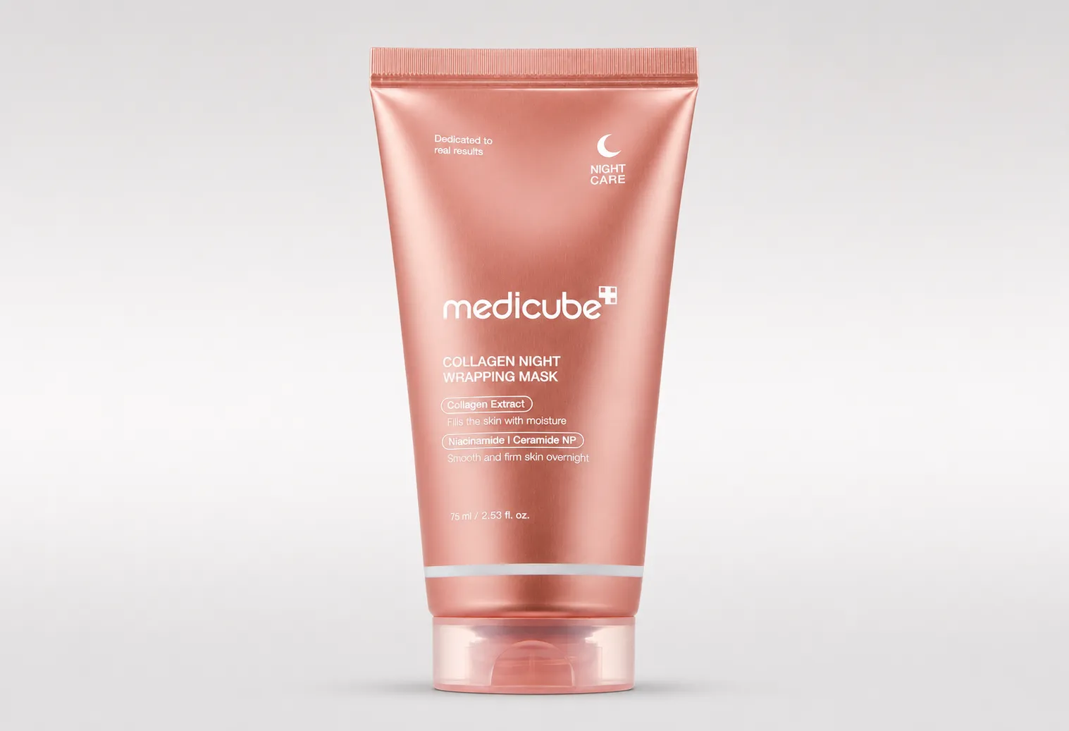 Medicube Collagen Night Wrapping Mask in pink tube on a neutral background